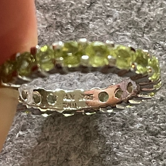 925 Sterling silver eternity ring band, possibly peridot.